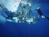 Alvin being tended to by divers.