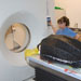 darlene ketten examines turtle at CT scanner