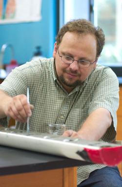 Liviu Giosan at work on a core in WHOI's McLean lab