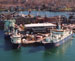 three ships at the WHOI dock