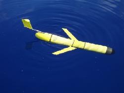 The thermal glider rests at the surface of Caribbean waters before diving into its mission between St. Thomas and St. Croix. (John Lund, Woods Hole Oceanographic Institution) The thermal glider rests at the surface of Caribbean waters before diving into its mission between St. Thomas and St. Croix. (John Lund, Woods Hole Oceanographic Institution)