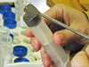 A mud core sample in the hands of Biology Postdoc Luciano Fernandes