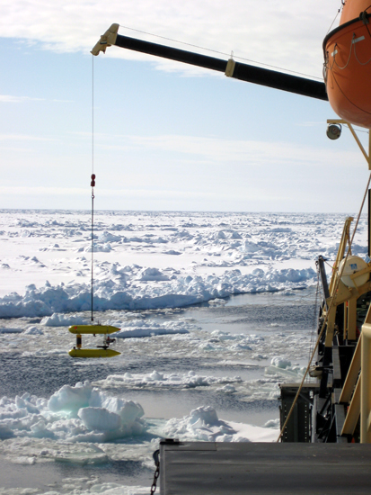 The Jaguar AUV is lowered into the Arctic Ocean from the icebreaker Oden during a June 2007 engineering test. (Clayton Kunz, Woods Hole Oceanographic Institution) The Jaguar AUV is lowered into the Arctic Ocean from the icebreaker Oden during a June 2007 engineering test. (Clayton Kunz, Woods Hole Oceanographic Institution)