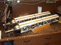 Sixteen REMUS-6000 battery modules assembled into two housings.