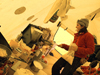 Andrea Burke cooking in the tent. 