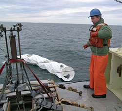 Dennis McGillicuddy launches a satellite-tracked drifter
