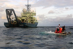 The research vessel Atlantis serves as the support vessel for Alvin operations.