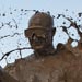 Mark Spear covered in mud