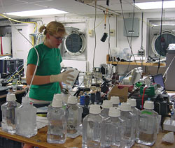 Sarah Bender, a Rutgers University researcher, processes water samples in the laboratory