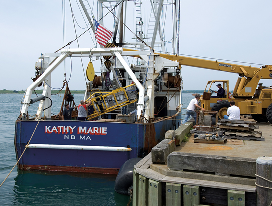 HabCam (short for ?habitat mapping camera system?) is hoisted aboard the scallop boat Kathy Marie for a test run.