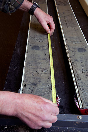 split sediment core being measured