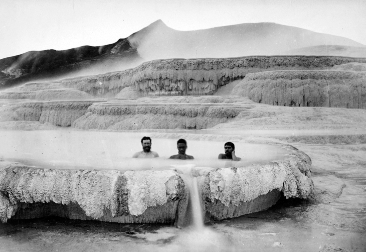 bathers in hot pool at White Terraces
