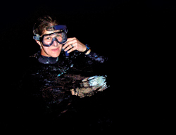Photo of Kelly Rakow Sutherland at the end of a research dive