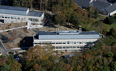 The capital campaign provided significant funds toward the construction of two new laboratories on the Quissett Campus: the Stanley W. Watson Laboratory (foreground) and the Marine Research Facility (left). (Photo by Bird's Eye View).