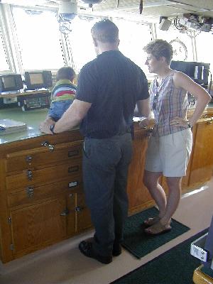Chief Engineer Moose Morris and Family on the Oceanus Bridge
