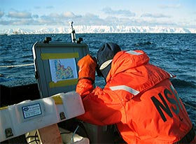 Greg Packard studies a bathymetry chart
