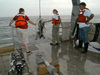 Summer Student Fellows launch a CTD off R/V Tioga in July 2006.