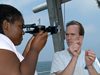 Tioga Captain Ken Houtler teaching Summer Student Fellow DeAnna McCadney how to use a sextant.