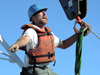 Jeff Lord directing the deployment of the WHOTS II buoy.