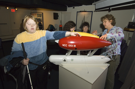 Perkins school student learning about Autonomous Underwater Vehicle ABE at Ocean Science Exhibit Center at Woods Hole Oceanographic Institution.