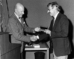 Board Chair Charles Francis Adams presents the Henry Bryant Bigelow Medal to Holger Jannasch in 1980 "in recognition of his creative contributions to marine microbiology by providing us with an understanding of the fundamentals of microbial processes in the sea and the dynamics of oceanic food chains." (Photo by Frank Medeiros)