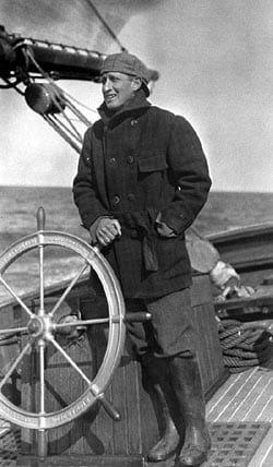 Henry Bigelow steers the U.S. Bureau of Fisheries vessel Grampus. While using the boat for surveys in the Gulf of Maine, Bigelow found it was not stable enough for oceanographic work, and its small hoisting engine could not handle heavy equipment. He applied his experience with Grampus to the design of WHOI's first research vessel, Atlantis. (Courtesy of WHOI Archives)