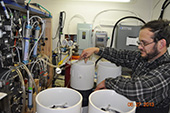 R.P. Kelly feeds dry ice into the cold trap as another 4 Keyblers are prepared for extraction.