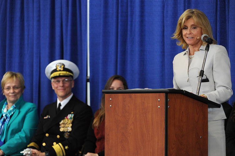 Carol Armstrong, ship's sponsor, delivers remarks during the christening ceremony for the Auxilliary General Oceanographic Research (AGOR) research vessel (R/V) Neil Armstrong (AGOR 27). 