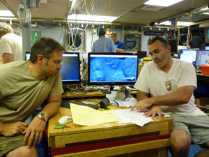 Chief Scientist, Rich Camilli, a WHOI environmental engineer, and co-principal investigator Chris Reddy, a WHOI marine chemist and oil spill expert, aboard the research vessel Endeavor in June 2010 in the Gulf of Mexico.