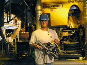 Sean Sylva with Seewald sampler prior to getting sample from wellhead