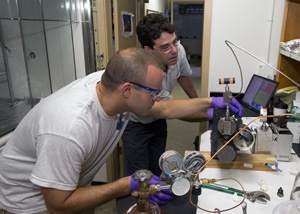 Sean Sylva and Jeff Seewald in the lab, working with Deepwater Horizon samples
