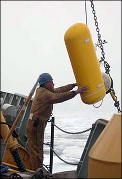 John Kemp recovering the McLane Moored Profiler.