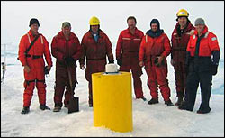 The IMB buoy (left), ITP buoy (foreground), and installation crew