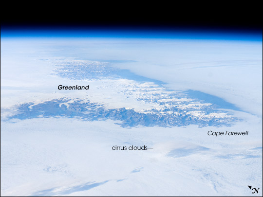 View of Cape Farewell from space, taken by astronauts on the international space station. The ice cap, some 3,000 meters high, is surrounded by rugged mountains cut by many fjords. 