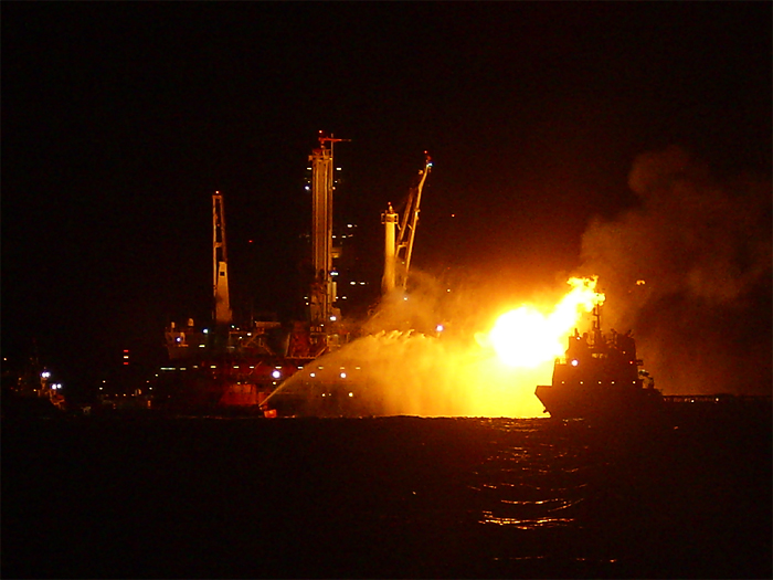 burning oil at night near Deepwater Horizon rig