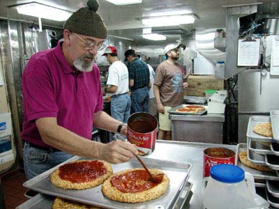 Jim making pizza