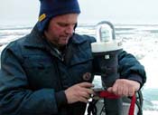 John inspects the Argos positioning beacon