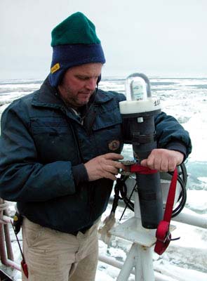 John inspects the Argos positioning beacon