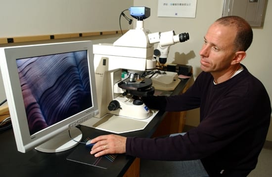 Simon Thorrold, at work in his lab at WHOI, heads the New Guinea project.