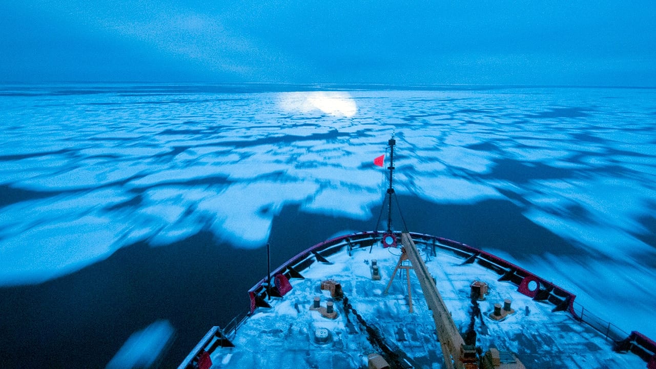 The U.S. Coast Guard icebreaker Healy moves through pancake ice in the Arctic's Chukchi Sea.