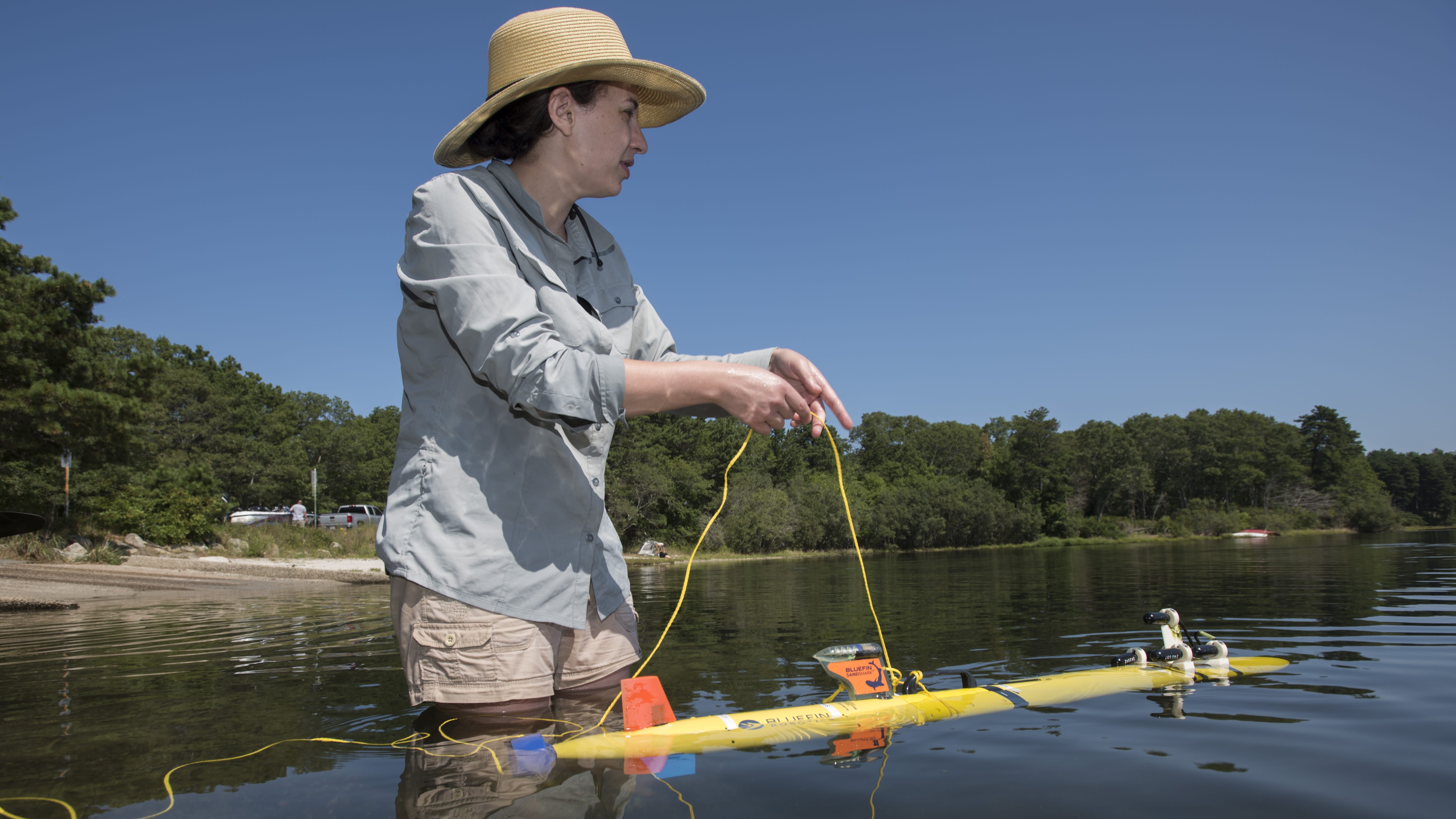 Erin Fischell testing new vehicles at Ashumet Pond on Cape Cod. Photo by Thomas N. Kleindinst | WHOI