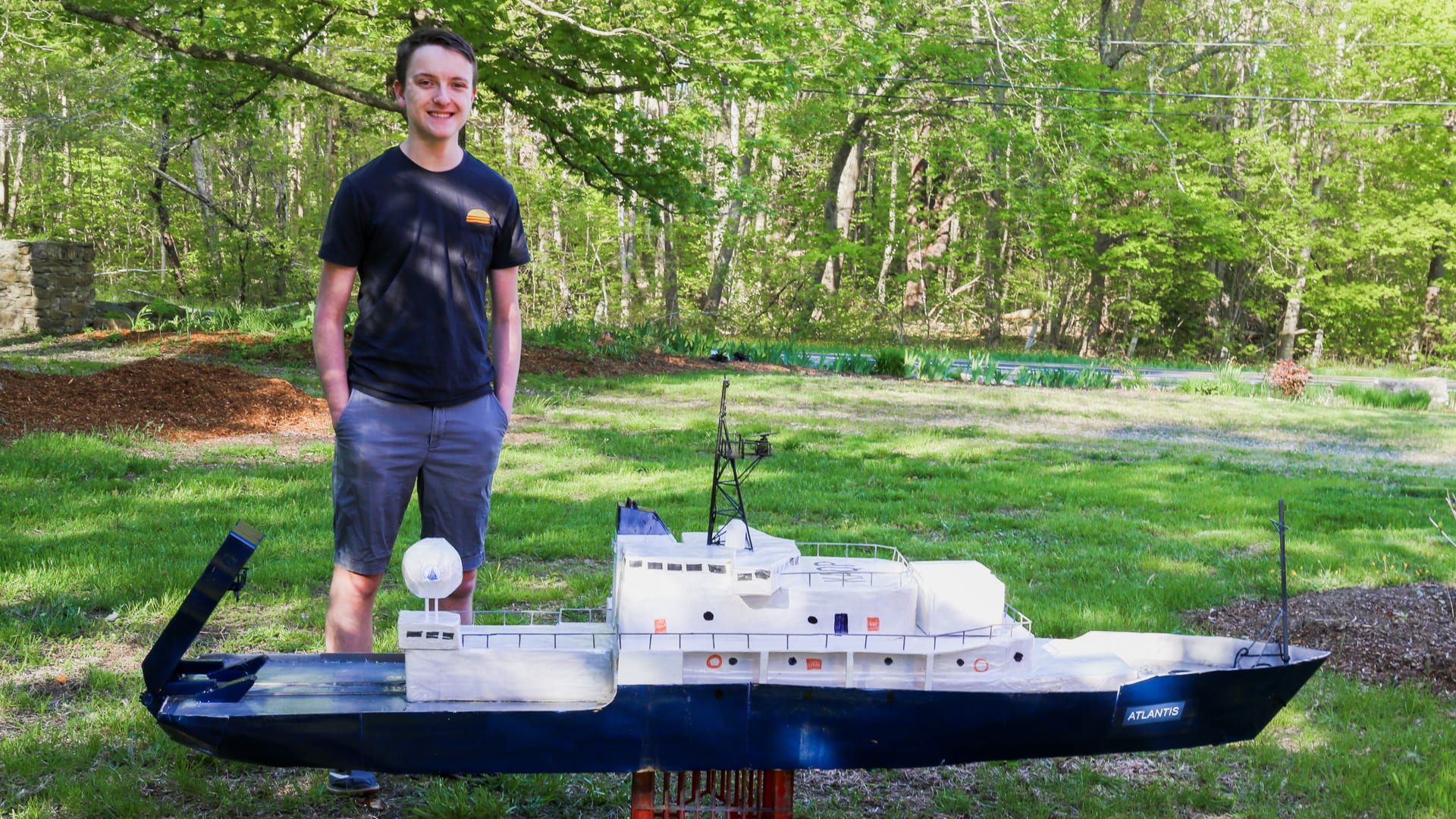 Dante Cusolito stands next to his completed radio-controlled model of R/V <em>Atlantis</em>, rendered at 1/34 the size of its real-life counterpart. (Photo courtesy of Dante Cusolito)