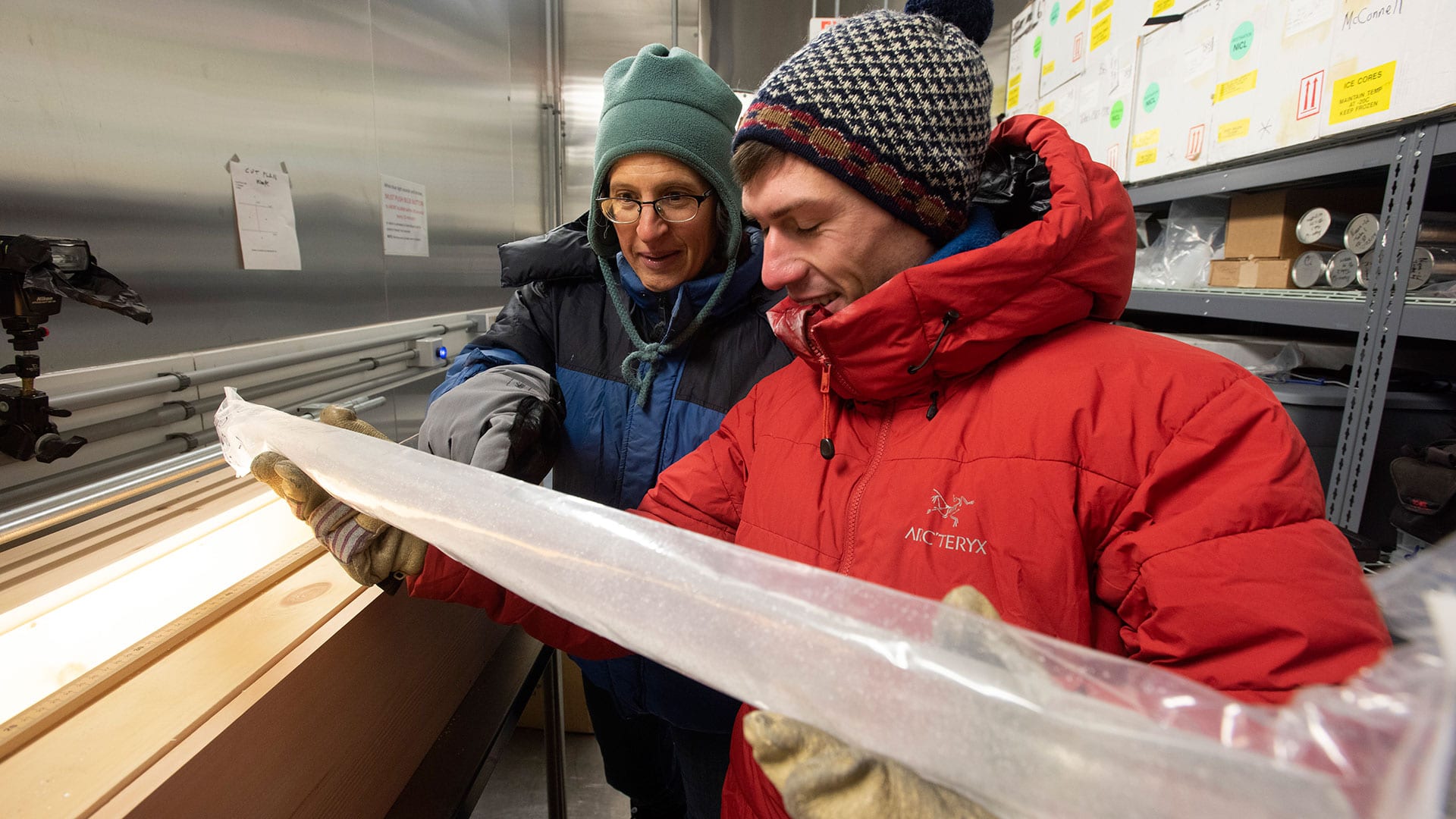 Sarah Das and Matt Osman examining a recovered ice core.