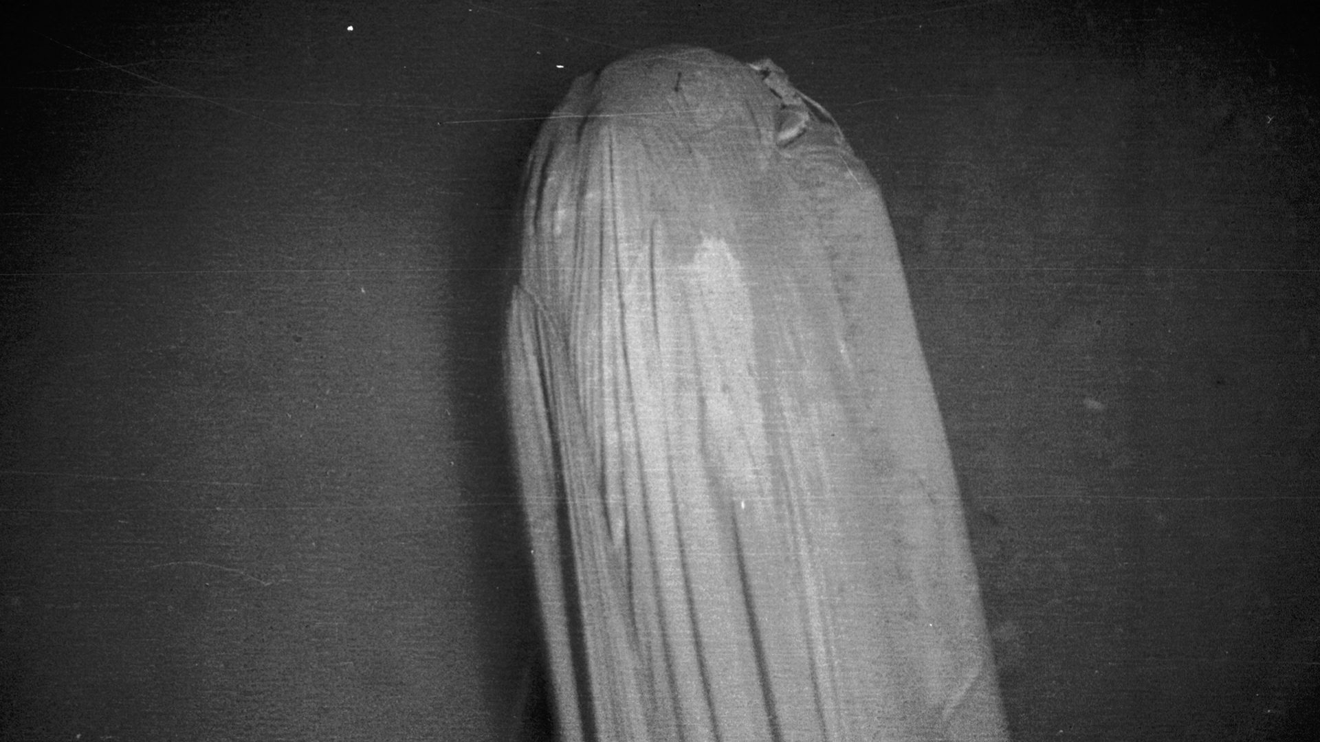 Alvin’s first glimpse at the lost H-bomb on the seafloor, covered by its parachute. (Photo courtesy of WHOI Archives, © Woods Hole Oceanographic Institution)