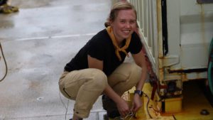 Amanda Sutherland working on the Sentry Van, which is a shipping container