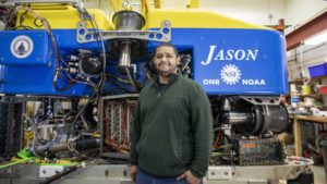 Mario Fernandez standing in front of Jason in Blake Lab.