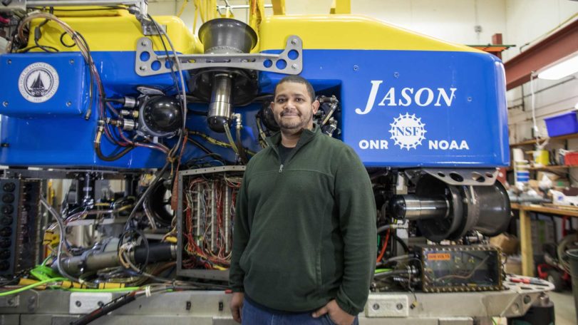 Mario Fernandez standing in front of Jason in Blake Lab.