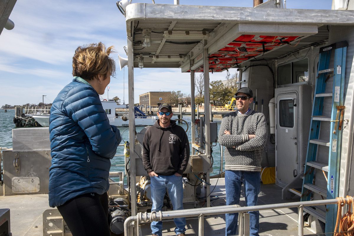During her tour, Gov. Healey stopped to chat with R/V Tioga Captain Pete Collins (right) and First Mate Jim Missios. (Photo by Jayne Doucette © Woods Hole Oceanographic Institution)