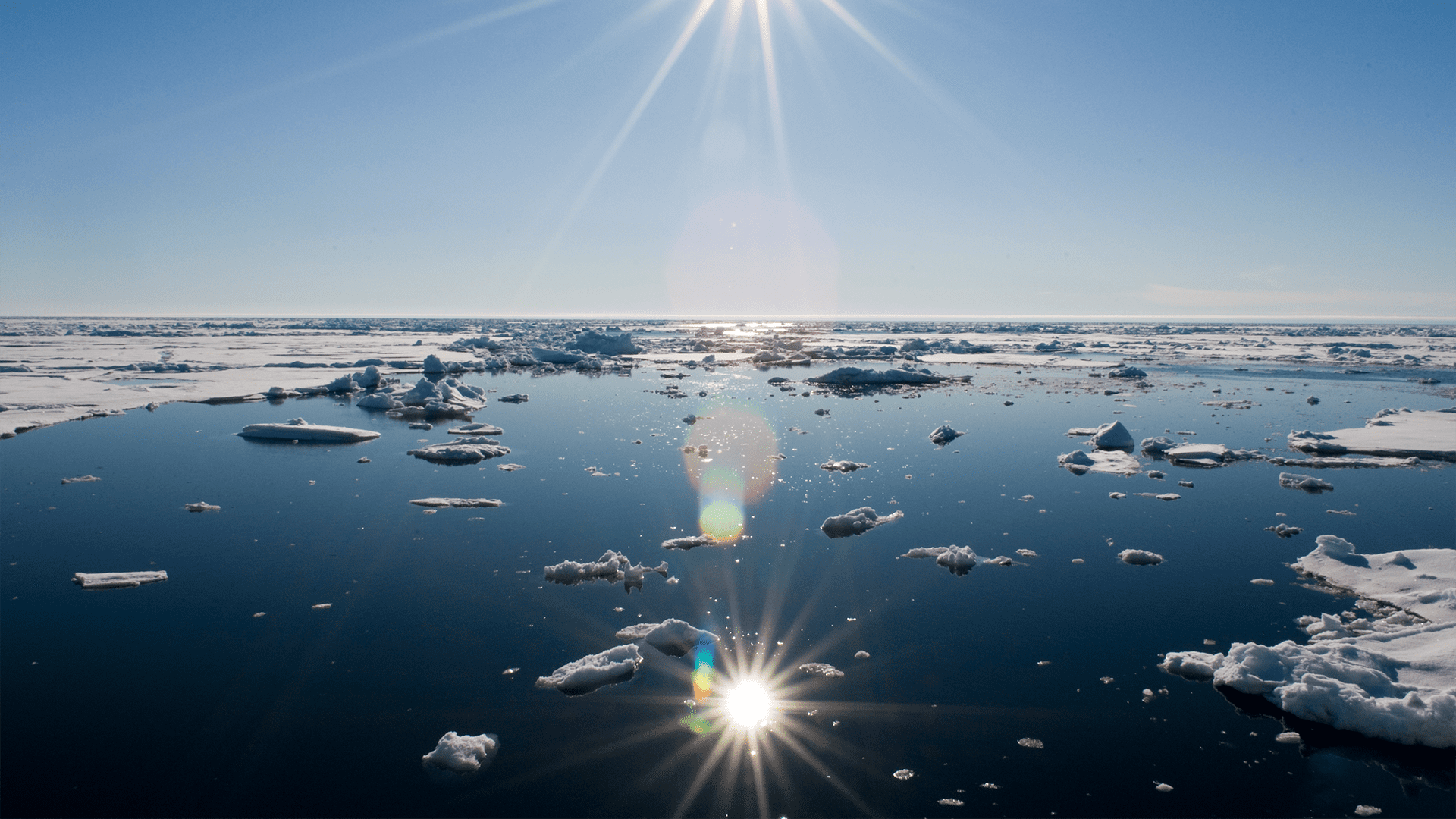 An Arctic sunburst reflects across the water during a WHOI-led expedition to the Arctic Ocean. (Photo by Chris Linder, © Woods Hole Oceanographic Institution)