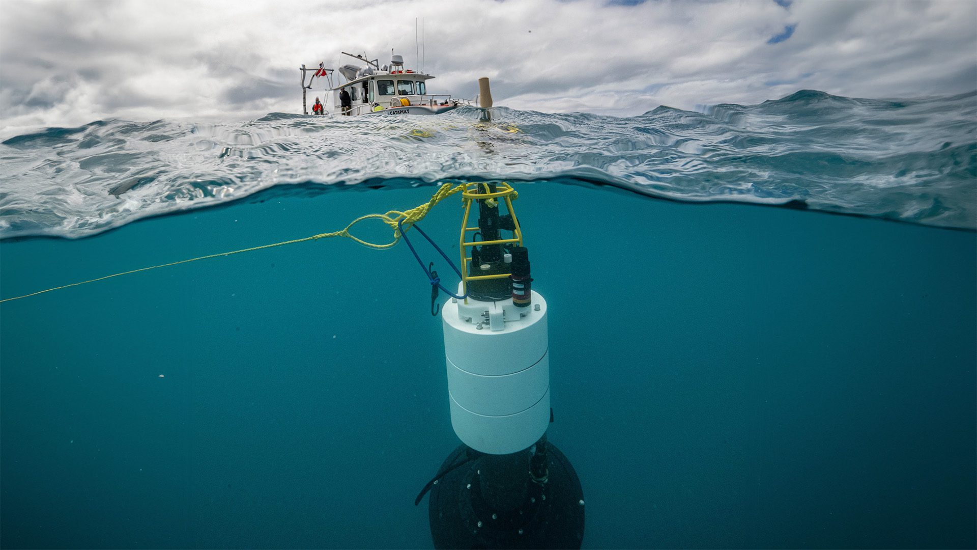 TZEX, the Twilight Zone Explorer, is deployed in the ocean to gather data about marine snow, biological particles that float through the water column, and serve the important role of transporting carbon from surface waters to the deep sea. (Photo by Evan Kovacs, © Woods Hole Oceanographic Institution)